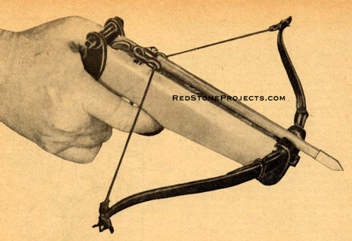 Man aiming a steel spring pistol crossbow.