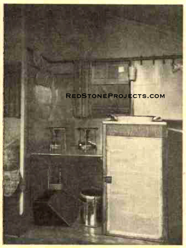 Figure. 5. A view of the inside of the rear compartment showing cupboard and stove compartment.