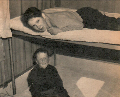 DOUBLE-DECKER bunk across front of trailer sleeps two at each level, is four feet wide.