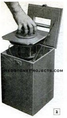 Figure 2. Gasoline lantern is carried in plywood box and has a plywood cutout fitted over the top of the lantern to protect from damage during travel.