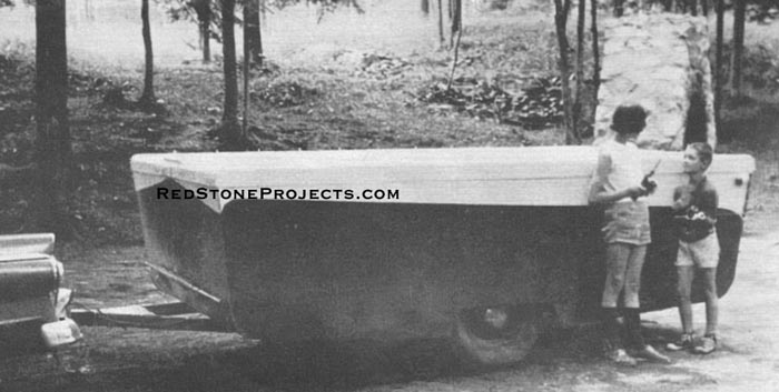 The MaxwellÃ¢â‚¬â„¢s trailer is shown in its folded position, ready for towing. In the position, the lower half of trailer door opens, a handy feature for roadside stops.