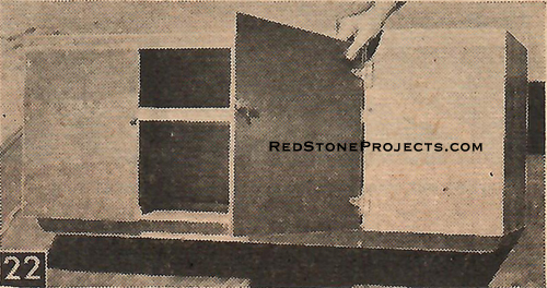 Figure 22. Storage boxes for food and utensils can be stacked for table or stove rest, and can be easily carried outside to cooking area. In aisle they form part of the bed.