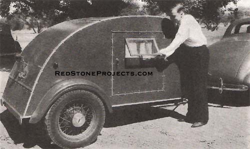 Louis Rodgers of Pasadena, designer and builder, demonstrates the novel window bracket. Normally, it is worked from the inside.