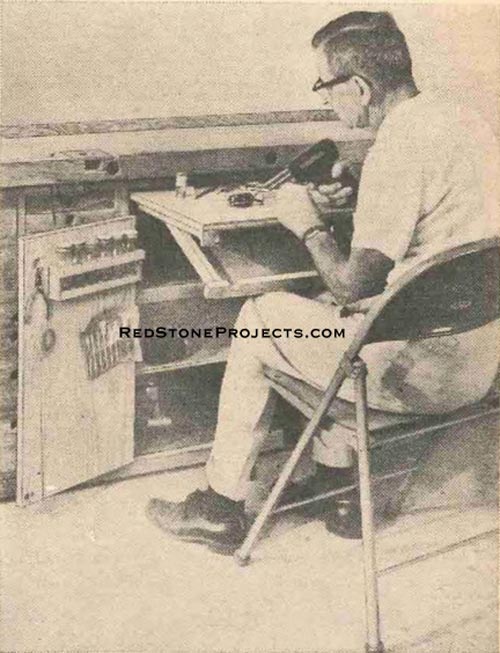Figure 1. Slide Out Electronics Bench and Catch Tray