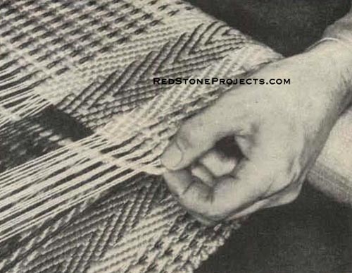 Figure 7. Before beating down weft, you carefully adjust extending double portion of weft along edge to produce straight edge.