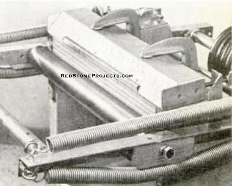 Upward movement of roller combined with a 90-deg. recessed bending form produces precise channel.