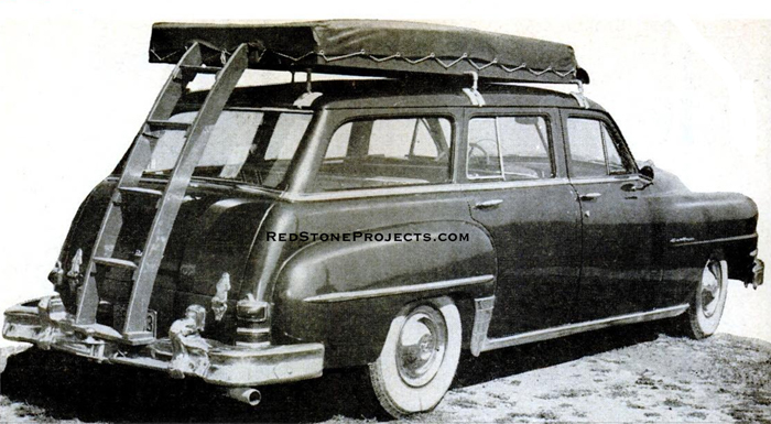 Picture of a vintage car top sleeper folded for travel.