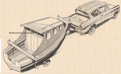 A 2-berth cabin cruiser towed by a small car.
