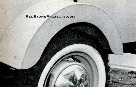 Fenders are required by some states can be made by a local by a local tinsmith. In summer, trailer rides on VW wheels with snow tires. In winter, the owner swaps wheels with the beetle.