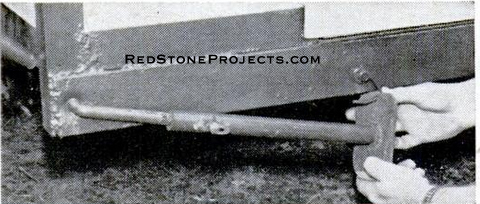 Telescoping levelers in the stowed, travel position.